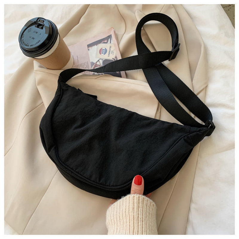 Tegan – Elegante Gebogen Dames Schoudertas