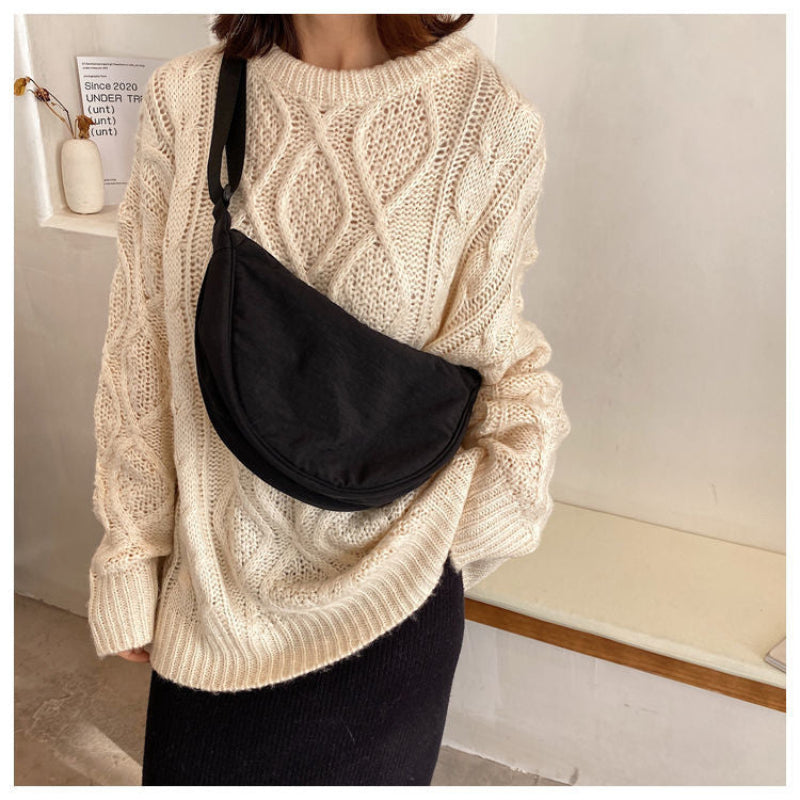 Tegan – Elegante Gebogen Dames Schoudertas