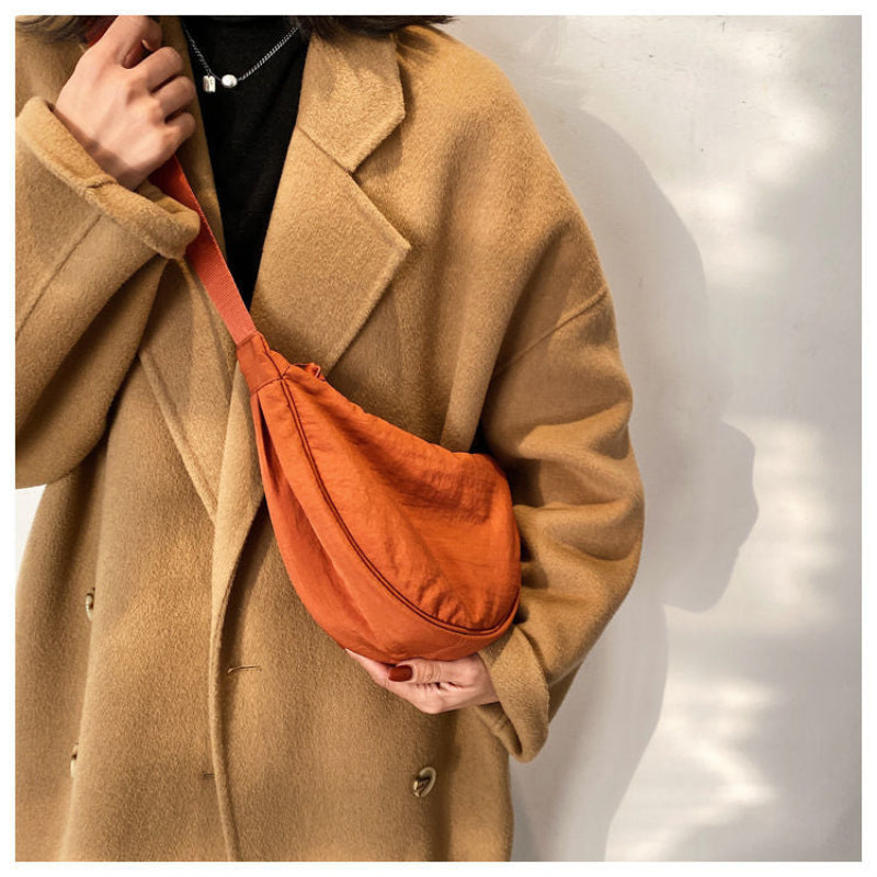Tegan – Elegante Gebogen Dames Schoudertas