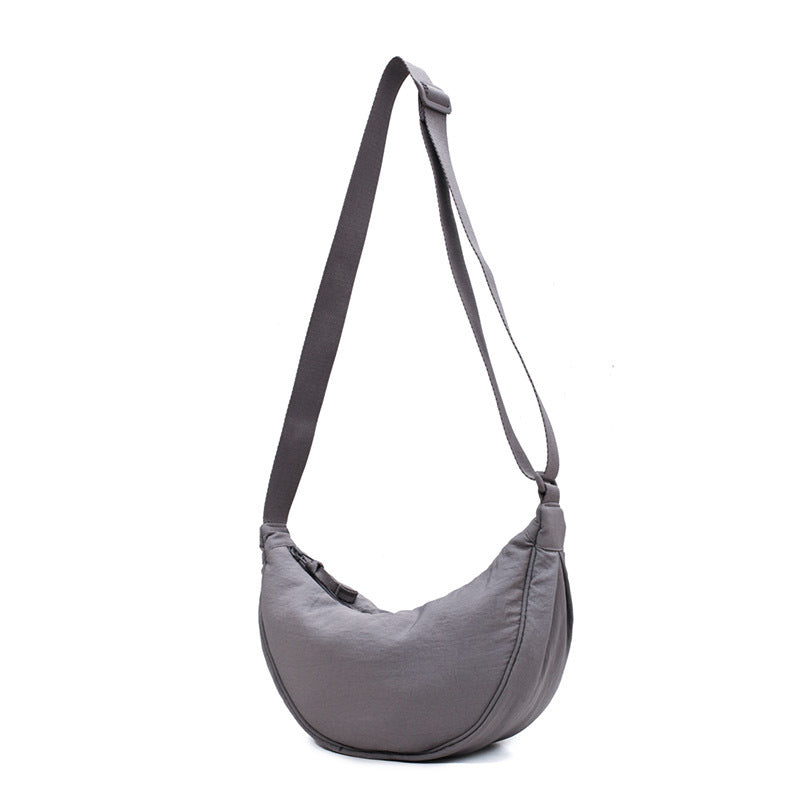 Tegan – Elegante Gebogen Dames Schoudertas