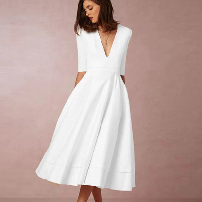 Elegante Midi Jurk met V-hals en Rok