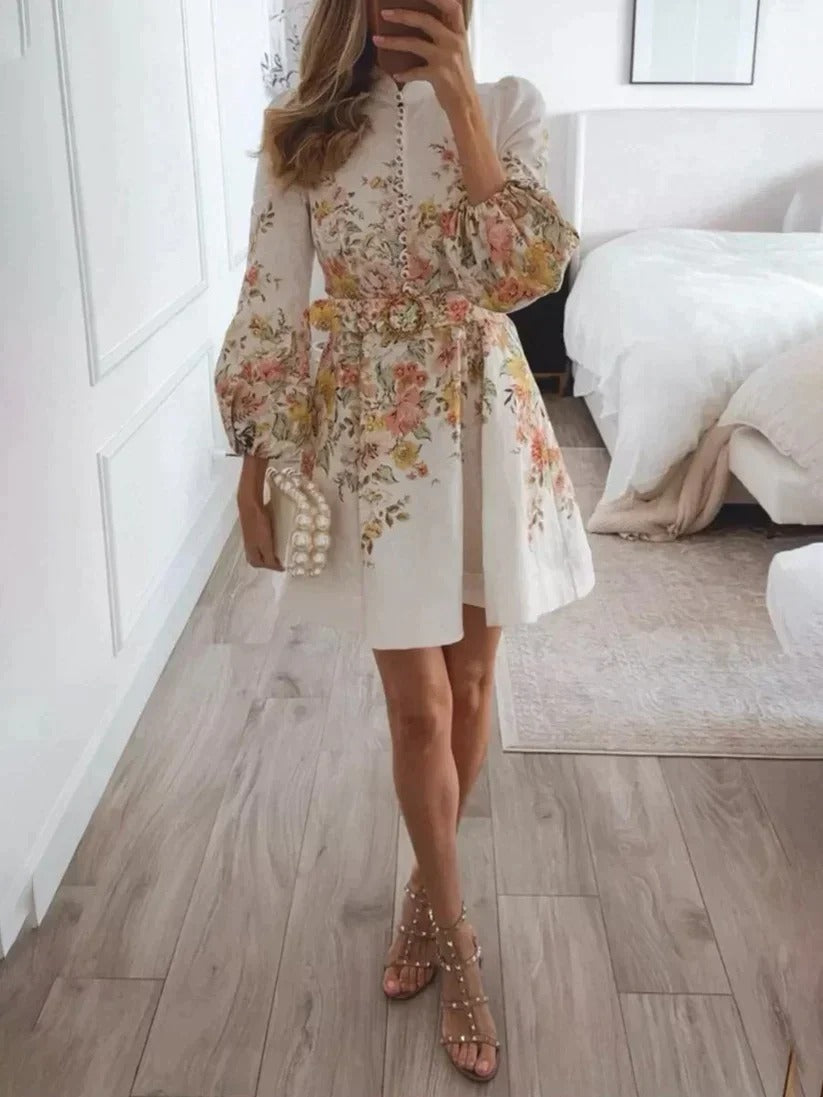 Mini-jurk met bloemenprint en knoopjes