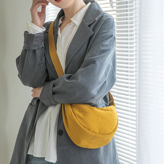 Tegan – Elegante Gebogen Dames Schoudertas